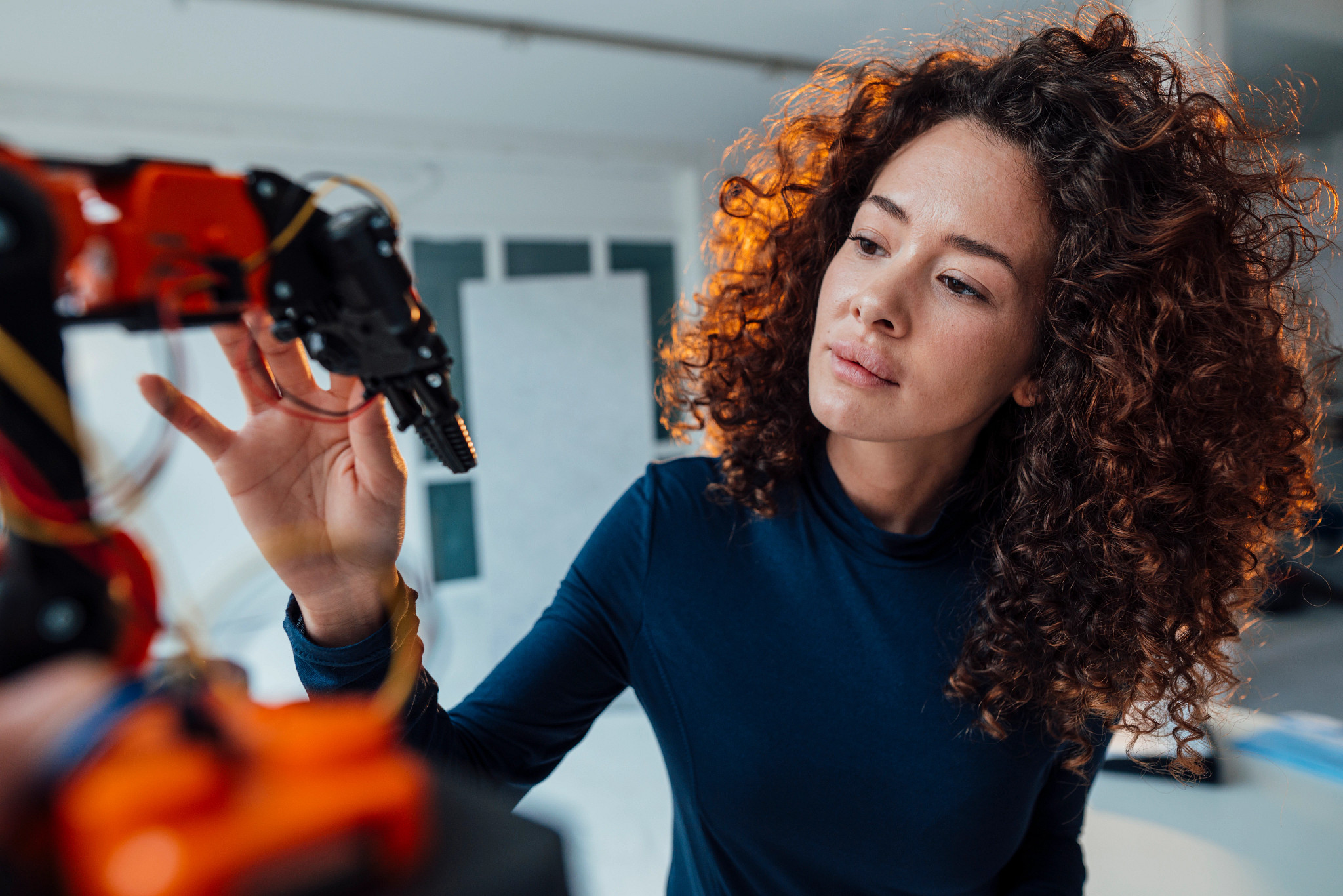 woman working with robotics
