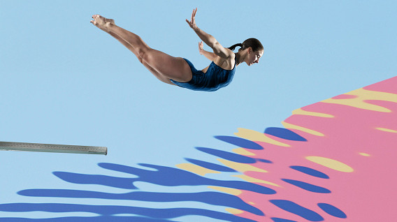 Lady in blue swimming suit diving in to graphic